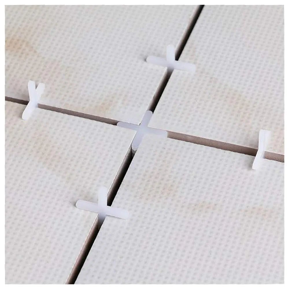 100pièces Spacers de carrelage 2,5 mm en plastique blanc - Adaptés pour les carreaux de céramique de sol et de mur avec des espaces en forme de croix, des joints de coulis réguliers, une installation facile, un design durable et flexible.