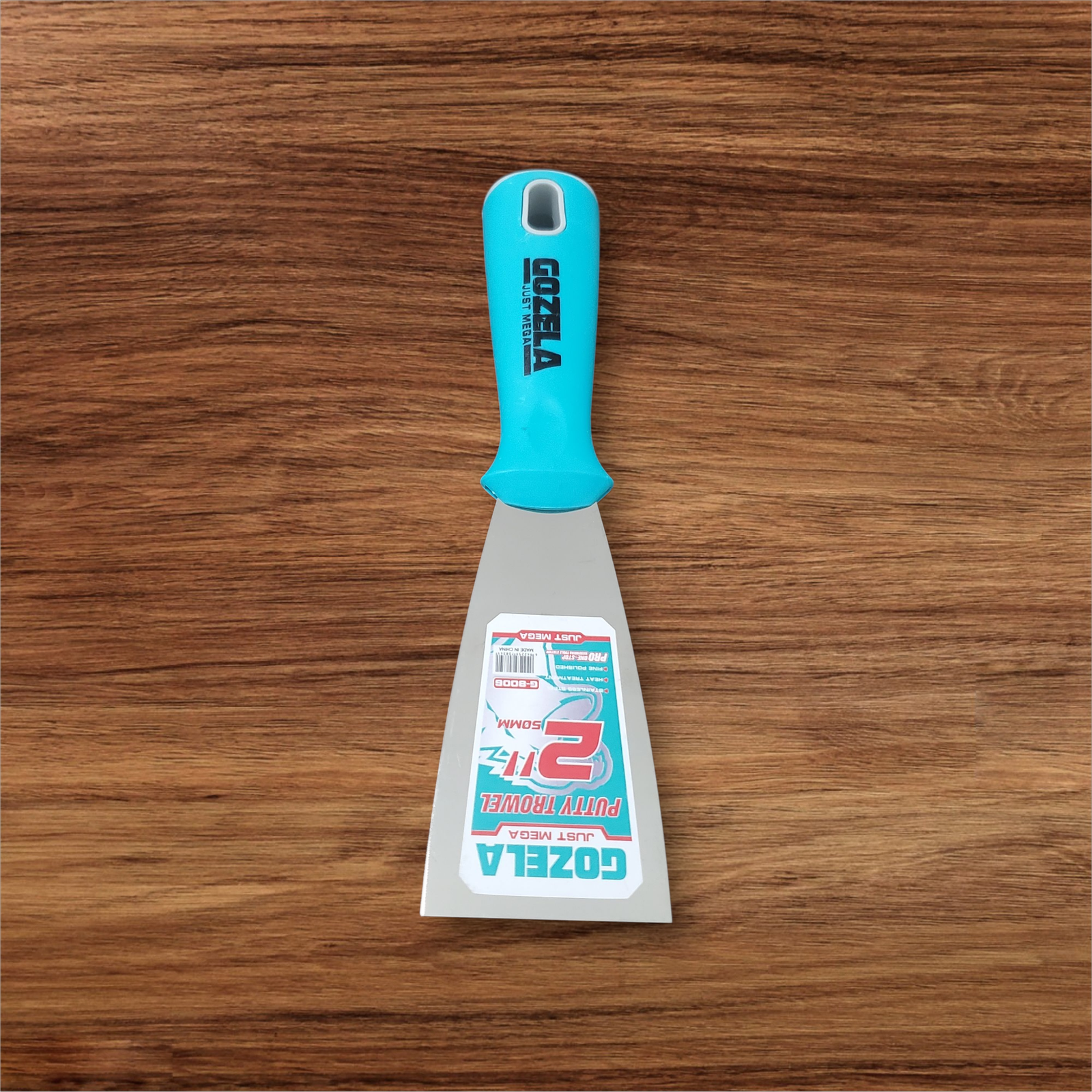 Spatule en acier inoxydable avec manche en plastique 2"