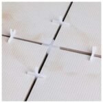 100pièces Spacers de carrelage 1,5 mm en plastique blanc - Adaptés pour les carreaux de céramique de sol et de mur avec des espaces en forme de croix, des joints de coulis réguliers, une installation facile, un design durable et flexible.
